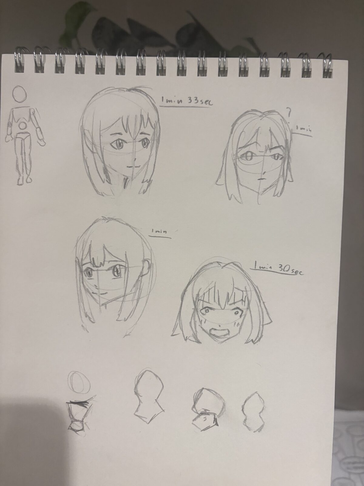 A page of quick face studies with timed sketches
